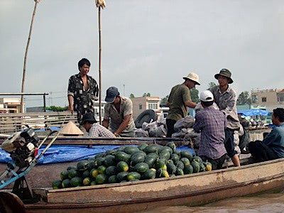 Vegetable sellers on the Mekong river