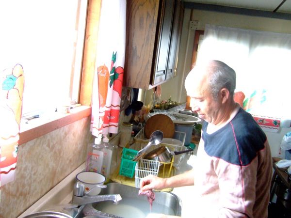 Dad washing the dishes